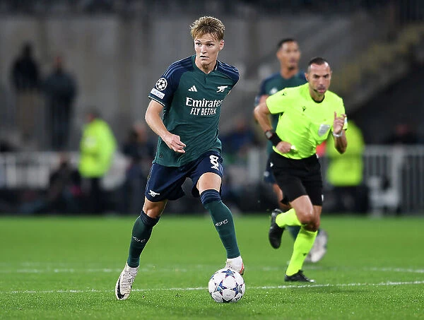 Arsenal's Martin Ødegaard in Action against RC Lens in 2023-24 UEFA Champions League