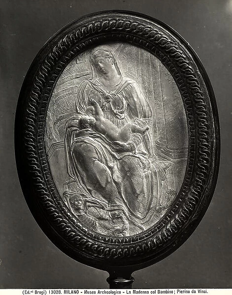Back side of a mirror with a bas-relief depicting the Madonna and Child, attributed to Pierino da Vinci, in the Archaeological Museum of Milan