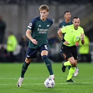 Arsenal's Martin Ødegaard in Action against RC Lens in 2023-24 UEFA Champions League